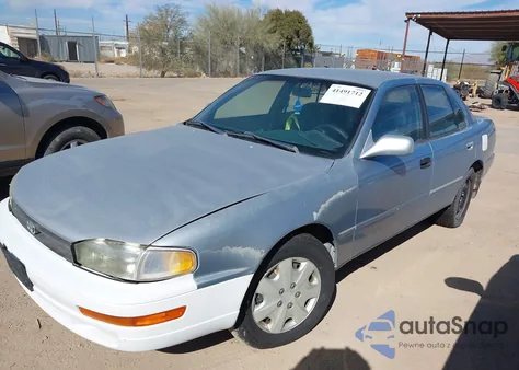 1993 Toyota Camry Le z USA, uszkodzony, nr VIN 4T1VK12E5PU098942